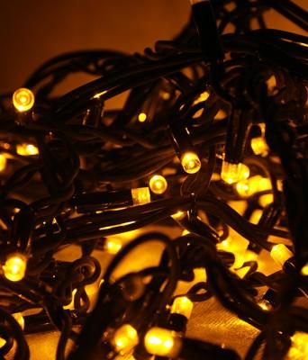 Светодиодная нить Laitcom, мерцание 100%, 75 LED, IP65,10м, 220-230V, черн. пр., желтый