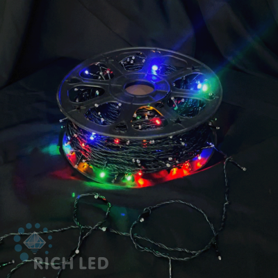 Светодиодная гирлянда Rich LED Нить 100 м, 24В, мерцание, провод черный/зеленый, IP54, мульти