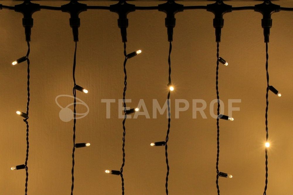 Светодиодный занавес Teamprof 2х6м, мерцание, черный провод, теплый белый Качественная картинка Светодиодный занавес Teamprof 2х6м, мерцание, черный провод, теплый белый