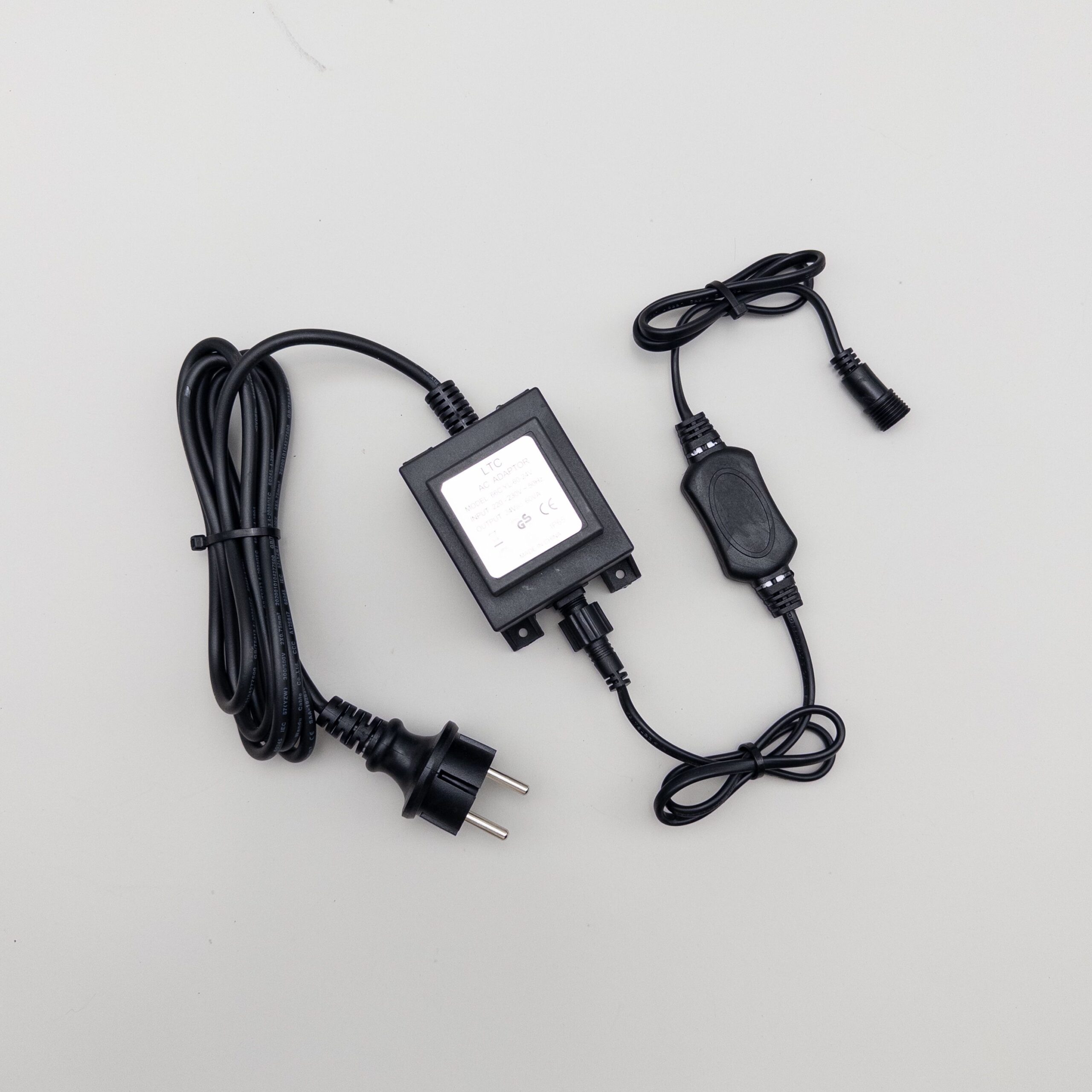 Качественная картинка Трансформатор Laitcom 60W с выпрямителем, 24V (до 1000 LED) Каучук, IP65